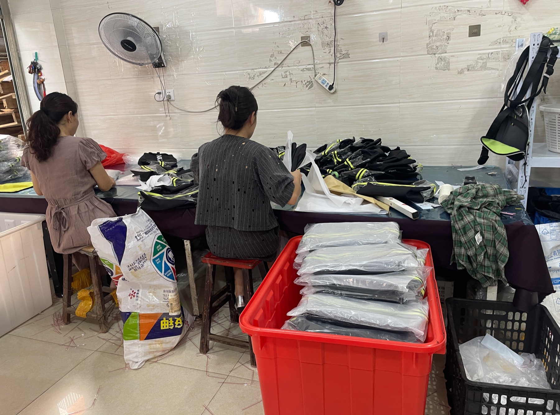 Packing finished bag orders in the workshop