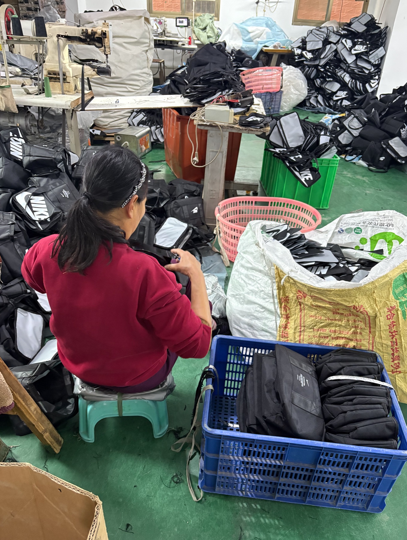 Workshop team organizing finished bags